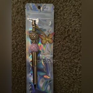Beautiful beaded pen with dangle charm